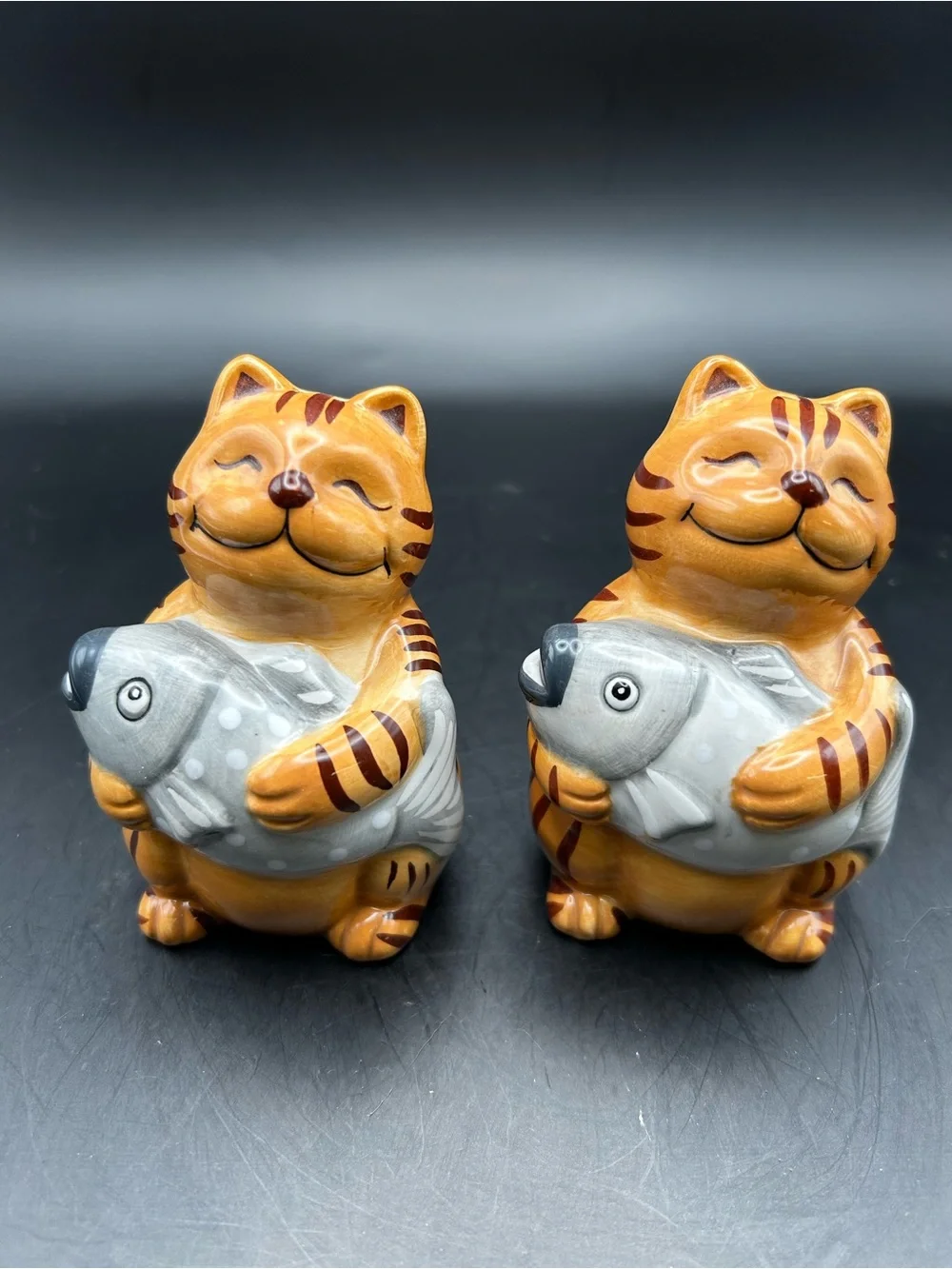Ceramic Orange Tabby Cat Shakers Holding Fish - Decorative Pet-Themed Statue